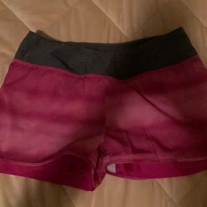 Pink work out shorts.